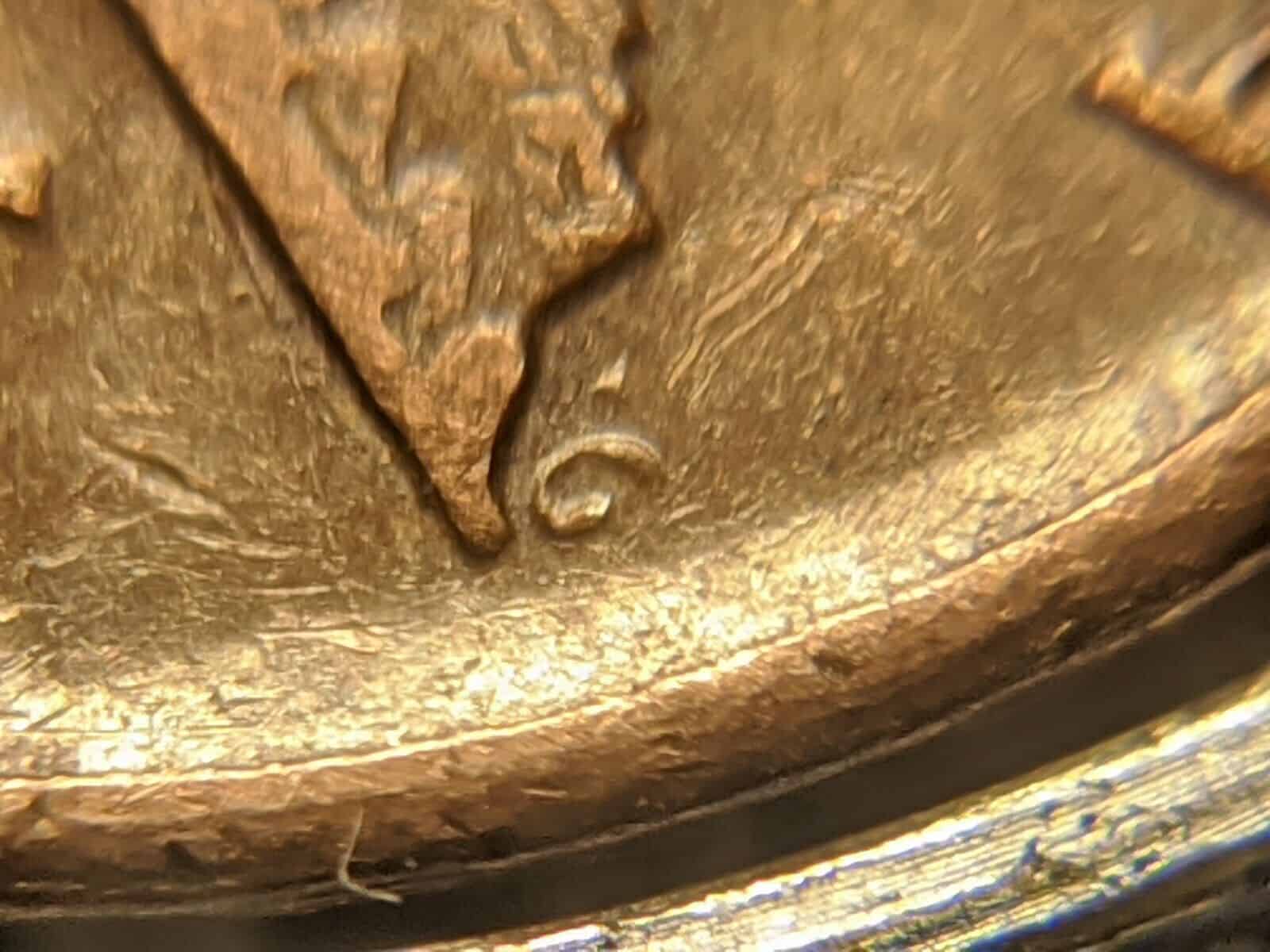 1975 Penny Obverse Struck Through a Capped Die